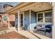 Cozy front porch with comfortable seating, perfect for relaxing outdoors at 2533 Central Park Blvd, Denver, CO 80238