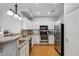 Bright kitchen features granite countertops, stainless steel appliances, and plenty of cabinet space at 2533 Central Park Blvd, Denver, CO 80238