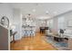 Open-concept living area with hardwood floors, natural light, and modern furnishings at 2533 Central Park Blvd, Denver, CO 80238