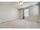 Bedroom with soft carpet, neutral walls, and a window with blinds at 3386 Valentia St, Denver, CO 80238