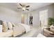 Spacious main bedroom showcasing an ensuite bathroom and walk-in closet at 3386 Valentia St, Denver, CO 80238