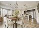 Spacious open-concept layout combines living, dining, and kitchen spaces, perfect for modern living and entertaining at 3386 Valentia St, Denver, CO 80238