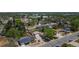 A beautiful aerial view of a quiet residential neighborhood with tree-lined streets at 1229 W 102Nd Ave, Northglenn, CO 80260