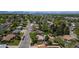 Gorgeous aerial view of a residential neighborhood with mature trees and mountain views at 1229 W 102Nd Ave, Northglenn, CO 80260