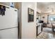 View of kitchen appliances and dining area at 7309 W Hampden Ave # 402, Lakewood, CO 80227