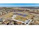 An aerial view of the community tennis courts and surrounding homes in the neighborhood at 618 S Carlton St, Castle Rock, CO 80104