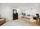 Cozy bedroom with carpet, dresser, and a guitar, offering a comfortable and inviting space at 618 S Carlton St, Castle Rock, CO 80104