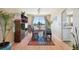 Warm dining room with wooden table, an area rug, and lots of natural light at 618 S Carlton St, Castle Rock, CO 80104