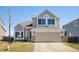 Charming two-story home featuring a two-car garage, stone accents, and well-maintained landscaping at 618 S Carlton St, Castle Rock, CO 80104