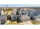 Aerial view of home with landscaping, driveway, and lawn at 618 S Carlton St, Castle Rock, CO 80104