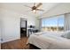 Bright main bedroom with vaulted ceiling, hard wood floors, and scenic views at 618 S Carlton St, Castle Rock, CO 80104