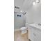 Updated bathroom features white vanity, toilet, and tiled shower at 5224 Scranton Ct, Denver, CO 80239