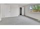 Bright bedroom with a large window, closet and neutral carpet at 5224 Scranton Ct, Denver, CO 80239