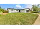 Charming single-story home featuring a two-car garage and well-maintained front lawn at 5224 Scranton Ct, Denver, CO 80239