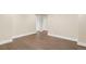 Basement space with laminate floors and white trim at 12790 Jackson St, Thornton, CO 80241