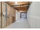 Unfinished basement with exposed ceiling and concrete floors at 12790 Jackson St, Thornton, CO 80241