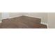 Finished basement area showcasing wood look floors and white trim at 12790 Jackson St, Thornton, CO 80241