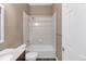 Neutral bathroom featuring a tub with a showerhead and a modern vanity at 12790 Jackson St, Thornton, CO 80241
