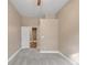 Spacious bedroom features a ceiling fan, neutral walls, and soft carpeting at 12790 Jackson St, Thornton, CO 80241