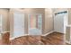 Inviting entryway with hardwood floors and white trim at 12790 Jackson St, Thornton, CO 80241