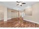 Expansive living room featuring hardwood floors, custom ceiling details, and ample natural light at 12790 Jackson St, Thornton, CO 80241