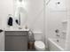 Bright bathroom featuring a vanity, toilet, and shower-tub combo at 3074 Belleville Ridge Rd, Elizabeth, CO 80107