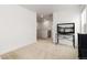 Hallway featuring plush carpet and a television on a wooden stand at 3074 Belleville Ridge Rd, Elizabeth, CO 80107