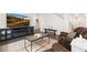 Open living space featuring a modern TV stand and comfortable seating area at 3074 Belleville Ridge Rd, Elizabeth, CO 80107