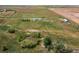 Vast aerial view of the property showcasing the expansive land, outbuildings, and peaceful surroundings at 39633 E 160Th Ave, Keenesburg, CO 80643