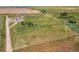 Expansive acreage featuring a modern home, barn, and private pond, offering a serene country lifestyle at 39633 E 160Th Ave, Keenesburg, CO 80643