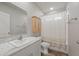 Cozy bathroom featuring wood floors, a vanity, and a shower at 39633 E 160Th Ave, Keenesburg, CO 80643