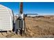 Outdoor electrical box and power pole with shed and barn in the background at 39633 E 160Th Ave, Keenesburg, CO 80643