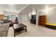 Basement living area with comfortable seating and storage at 21885 Whirlaway Ave, Parker, CO 80138