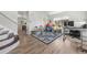 playroom with laminate floors, lots of light, toys, and area rug at 21885 Whirlaway Ave, Parker, CO 80138