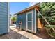Backyard Storage shed featuring a well-maintained exterior, positioned on a gravel surface at 21885 Whirlaway Ave, Parker, CO 80138