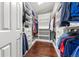 Organized walk-in closet with custom shelving and ample storage space at 21885 Whirlaway Ave, Parker, CO 80138