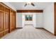 Inviting bedroom with wood accents, natural light, and a cozy ambiance at 9303 Dauntless Way, Conifer, CO 80433