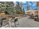 Back deck with outdoor seating and a view of the yard at 983 S Ouray St, Aurora, CO 80017