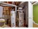 Basement utility room with water heater and furnace at 983 S Ouray St, Aurora, CO 80017