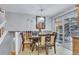 Upstairs dining area with sliding door access to the outdoor patio at 983 S Ouray St, Aurora, CO 80017