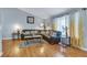 Comfortable living room featuring hardwood floors and lots of natural light at 983 S Ouray St, Aurora, CO 80017