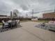 Backyard with patio, outdoor furniture, shed, and a partial lawn at 10948 Murray Dr, Northglenn, CO 80233