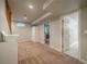 Basement area with carpet, neutral walls, storage and access to other rooms at 10948 Murray Dr, Northglenn, CO 80233
