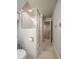 Clean bathroom featuring a glass shower and neutral paint at 10948 Murray Dr, Northglenn, CO 80233