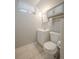 Small bathroom featuring a toilet and vanity with storage at 10948 Murray Dr, Northglenn, CO 80233