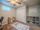 Bedroom with carpet, shoe storage, and closet at 10948 Murray Dr, Northglenn, CO 80233