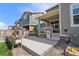 Charming backyard with a patio, playhouse, and a beautiful flower box, perfect for outdoor Gathering activities at 723 176Th Ave, Broomfield, CO 80023