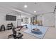 Finished basement area featuring gym equipment, and a play area, ready for recreation and fitness at 723 176Th Ave, Broomfield, CO 80023
