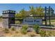Entrance to Palisade Park featuring a stone sign and manicured landscaping at 723 176Th Ave, Broomfield, CO 80023