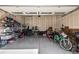 Spacious two-car garage offering ample storage with organized shelving and room for parking and hobbies at 723 176Th Ave, Broomfield, CO 80023